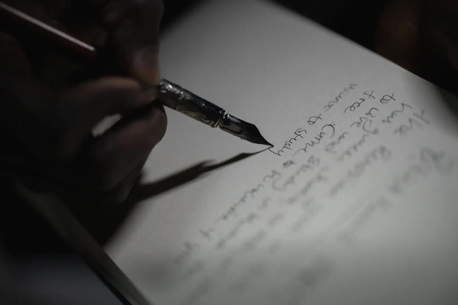 Fountain pen writing on a page