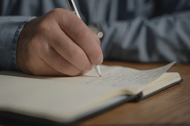 Hand writing in a notebook